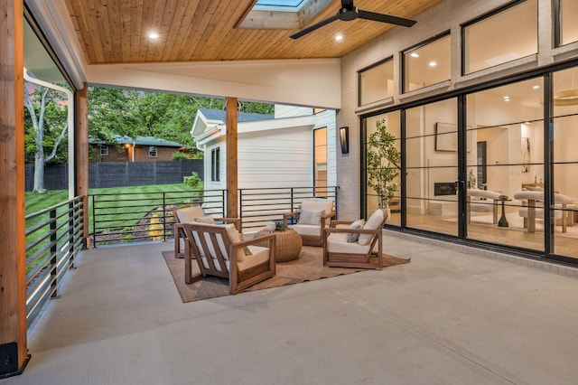view of patio / terrace featuring an outdoor living space and a ceiling fan