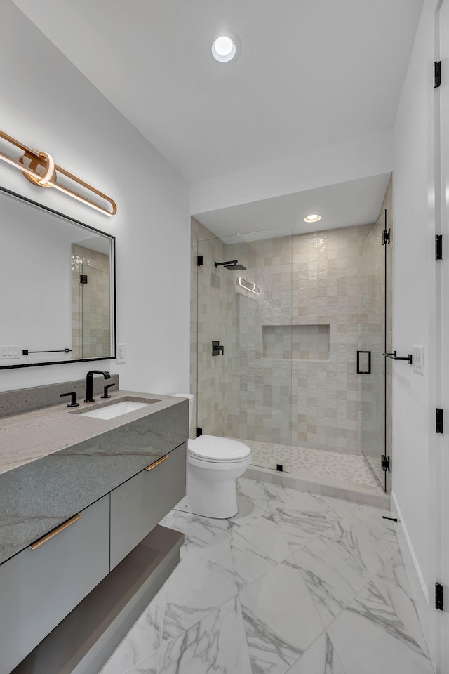 full bathroom with vanity, marble finish floor, recessed lighting, and a stall shower