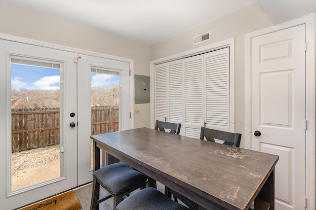 office featuring french doors, visible vents, and electric panel