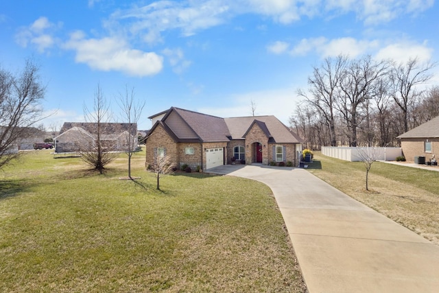 french country style house with a garage, brick siding, fence, concrete driveway, and a front lawn