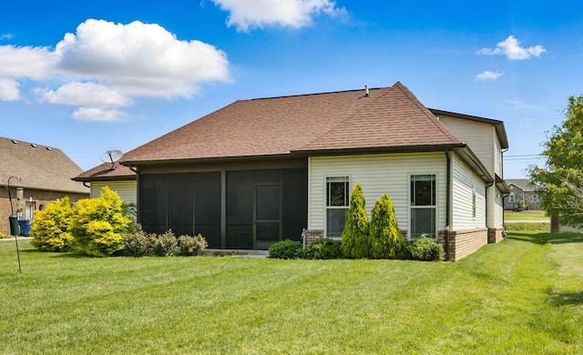 4268 Sango Rd, Clarksville, TN 37043 - back of house featuring a sunroom, roof with shingles, and a yard