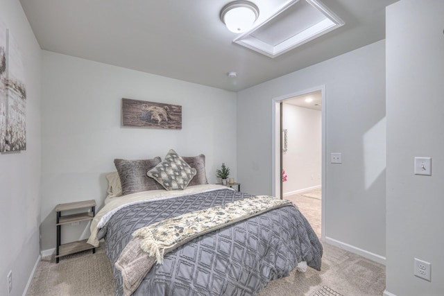 carpeted bedroom with baseboards