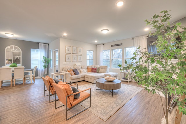 living room featuring recessed lighting and light wood finished floors