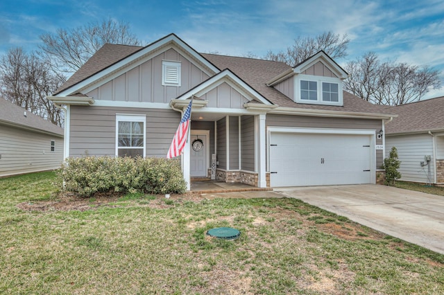 view of front of property featuring a shingled roof, concrete driveway, board and batten siding, a front yard, and stone siding