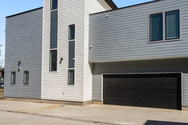 view of home's exterior with a garage