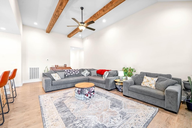 living area featuring beam ceiling, recessed lighting, visible vents, ceiling fan, and light wood-type flooring