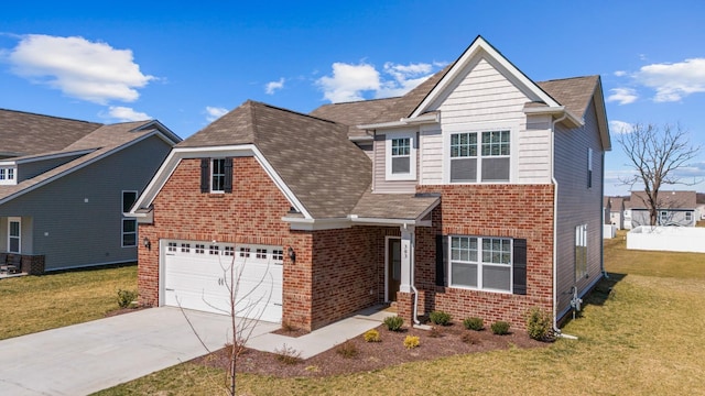 traditional-style house with a garage, concrete driveway, brick siding, and a front yard