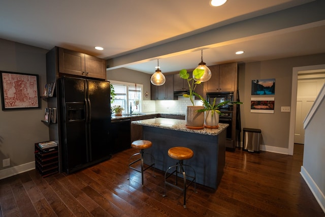 kitchen with black appliances, tasteful backsplash, dark wood finished floors, and baseboards