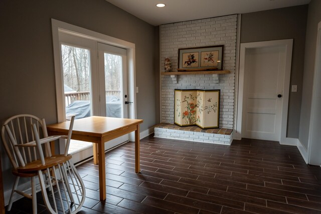 interior space featuring wood finish floors, recessed lighting, and baseboards