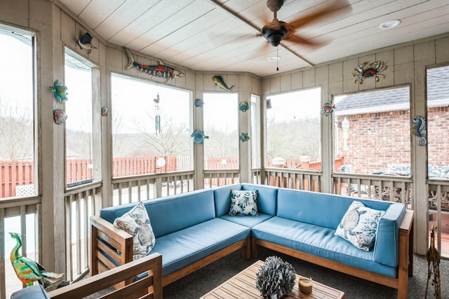 sunroom / solarium with ceiling fan