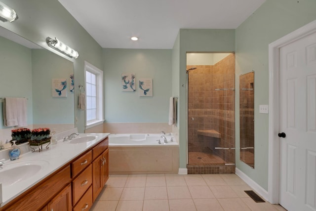 full bath featuring tile patterned flooring, visible vents, a sink, and a bath