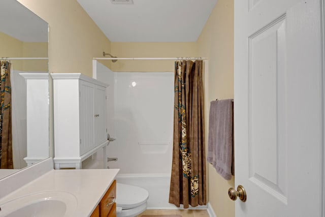 full bathroom with toilet, visible vents, shower / bath combination with curtain, and vanity