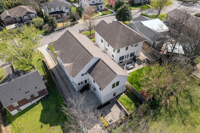 birds eye view of property with a residential view