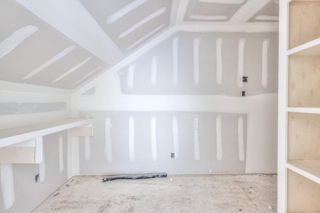 bonus room with vaulted ceiling