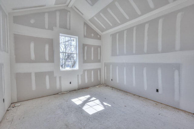 empty room with high vaulted ceiling