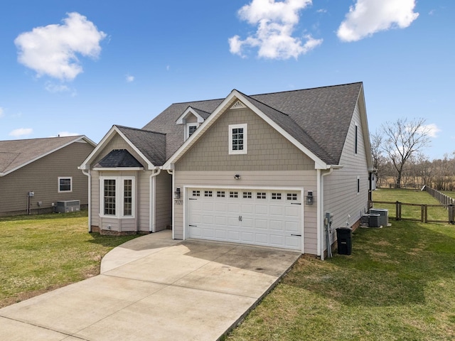 view of front of property featuring driveway, central air condition unit, a front lawn, and roof with shingles