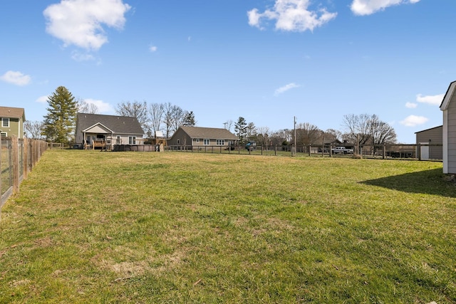 view of yard with fence