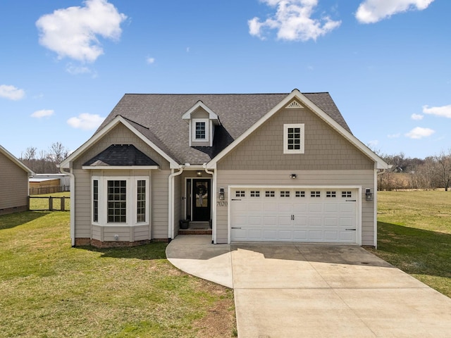 view of front of house featuring driveway, a garage, a shingled roof, fence, and a front yard