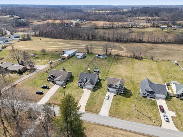 birds eye view of property featuring a rural view