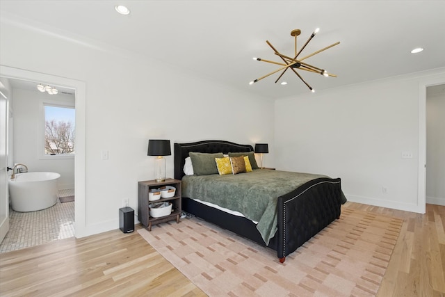 bedroom featuring baseboards, ornamental molding, wood finished floors, and recessed lighting