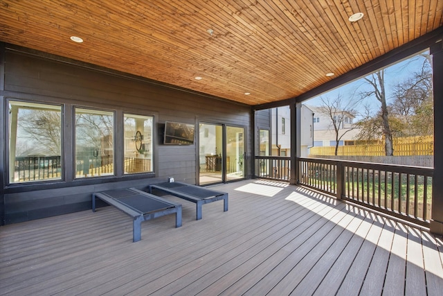 wooden deck featuring fence