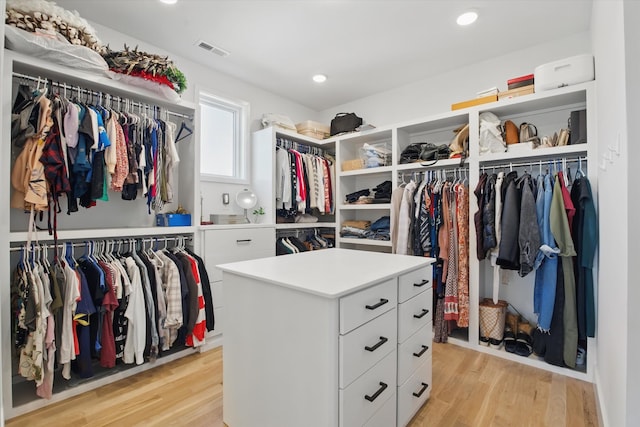 spacious closet featuring visible vents and light wood finished floors