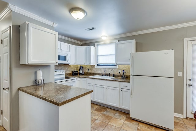 kitchen featuring white appliances, a sink, visible vents, white cabinets, and dark countertops