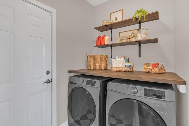 laundry room with laundry area and separate washer and dryer