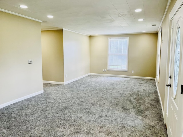 spare room featuring ornamental molding, recessed lighting, carpet flooring, and baseboards