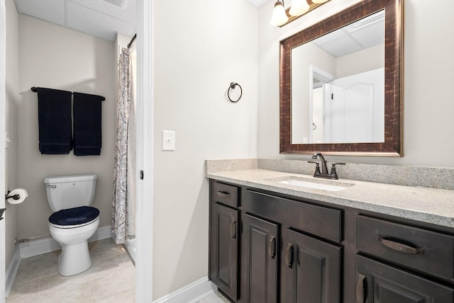 full bath featuring baseboards, vanity, toilet, and tile patterned floors