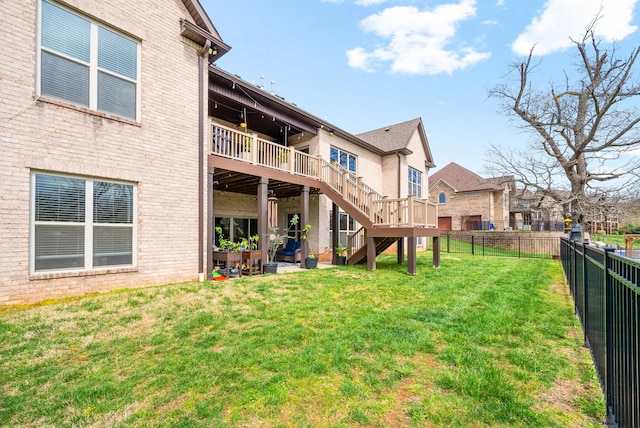 2425 Settlers Trce, Clarksville, TN 37043 - rear view of property with a fenced backyard, stairs, a deck, and a yard