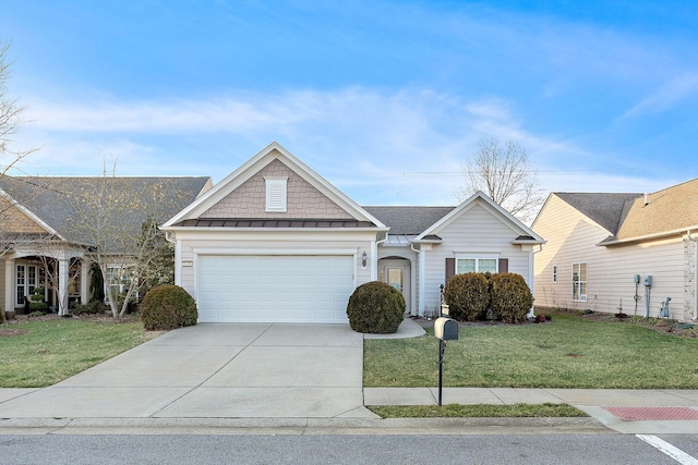 view of front of property with a garage, concrete driveway, a standing seam roof, and a front yard