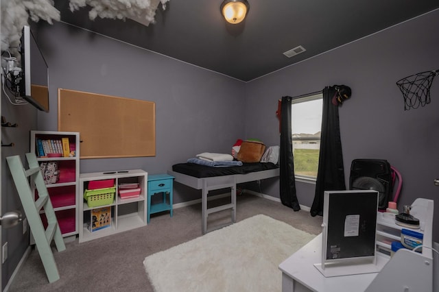 bedroom with carpet flooring, visible vents, and baseboards