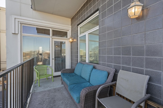 balcony with an outdoor hangout area