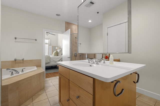 ensuite bathroom featuring a bath, ensuite bath, tile patterned flooring, and visible vents