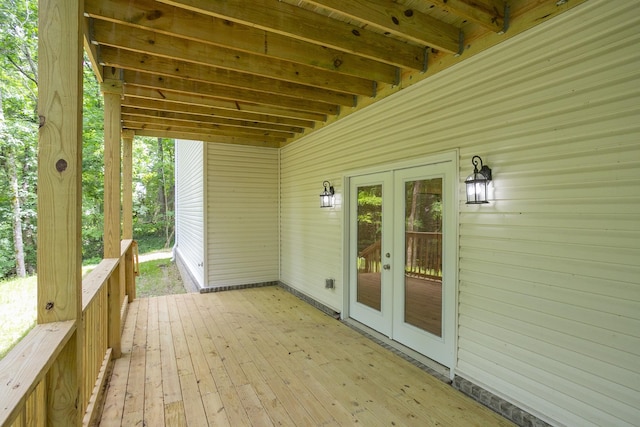 wooden terrace featuring french doors