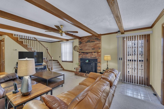 living area with light tile patterned floors, light colored carpet, stairway, beamed ceiling, and a textured ceiling