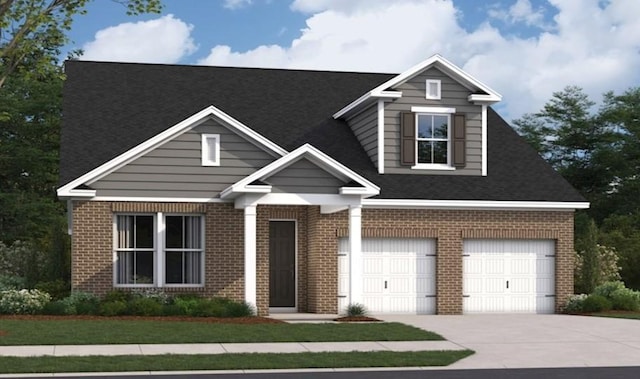 view of front of house with concrete driveway and brick siding