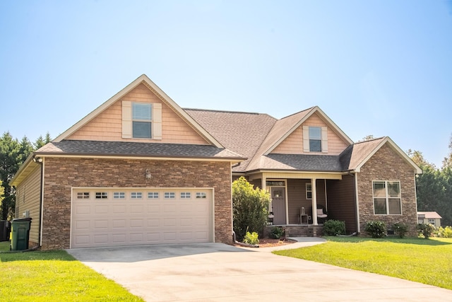 craftsman inspired home with driveway, a shingled roof, a front lawn, and a porch