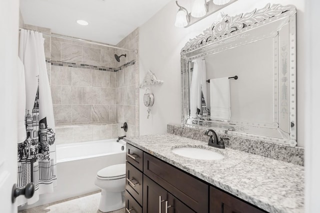 full bathroom featuring vanity, shower / bath combination with curtain, and toilet