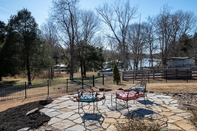 view of patio / terrace featuring fence