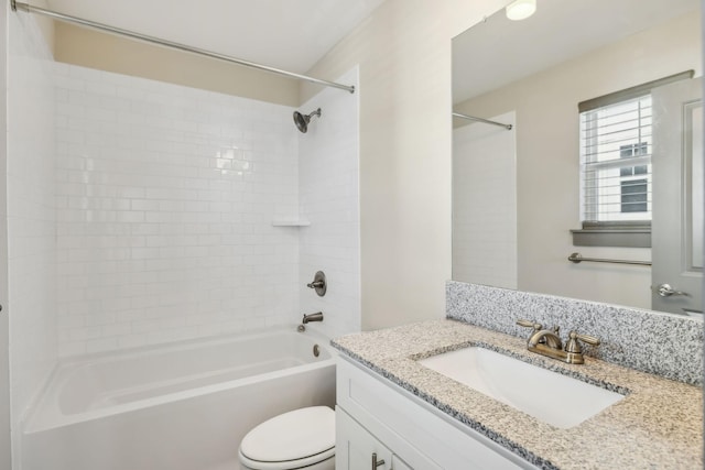 bathroom with  shower combination, vanity, and toilet