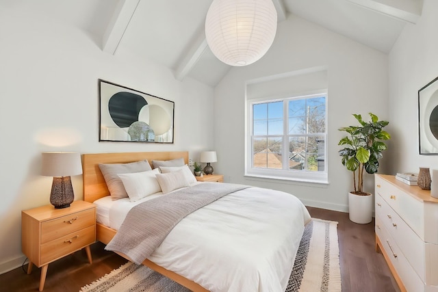 bedroom with dark wood-style flooring, lofted ceiling with beams, and baseboards