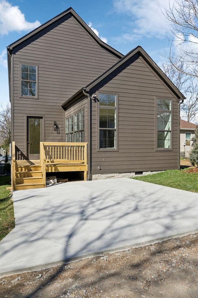 rear view of house with a deck