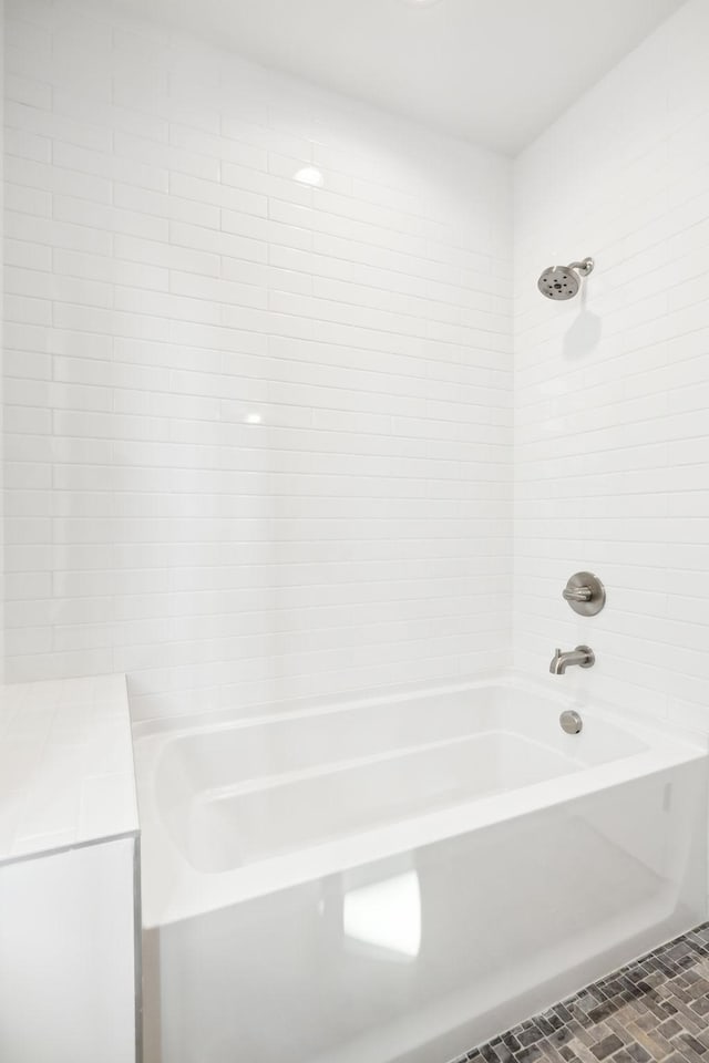 full bathroom with shower / bathtub combination