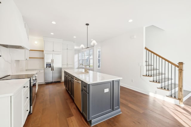 kitchen featuring gray cabinetry, stainless steel appliances, dark wood-style floors, open shelves, and custom range hood