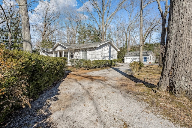 view of home's exterior featuring an outdoor structure