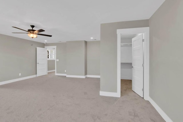919 Licinius Ln, Murfreesboro, TN 37128 - unfurnished bedroom featuring ceiling fan, baseboards, a spacious closet, and carpet