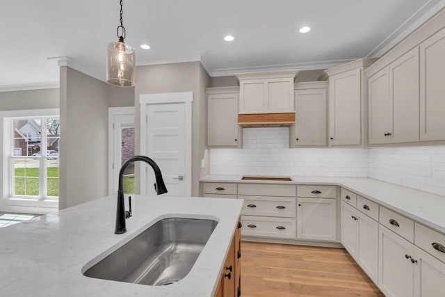 919 Licinius Ln, Murfreesboro, TN 37128 - kitchen featuring decorative light fixtures, backsplash, a sink, and ornamental molding