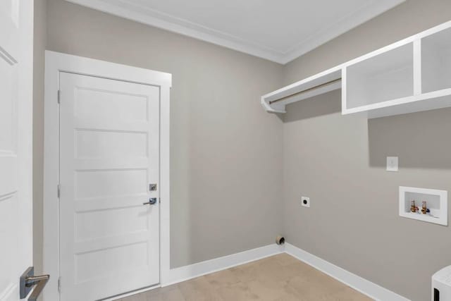 919 Licinius Ln, Murfreesboro, TN 37128 - laundry area featuring electric dryer hookup, baseboards, crown molding, washer hookup, and laundry area